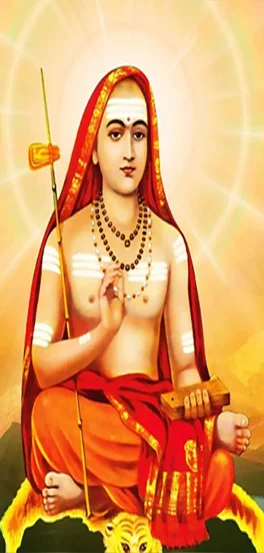 Pandit Sri S N Shastri Garu, seated in traditional attire